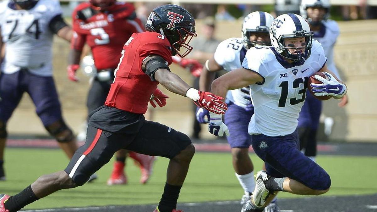 TCU receiver Ty Slanina moves upfield for a first down before being tackled against Texas Tech last season. Slanina suffered a broken collarbone on the play and missed the rest of the season.