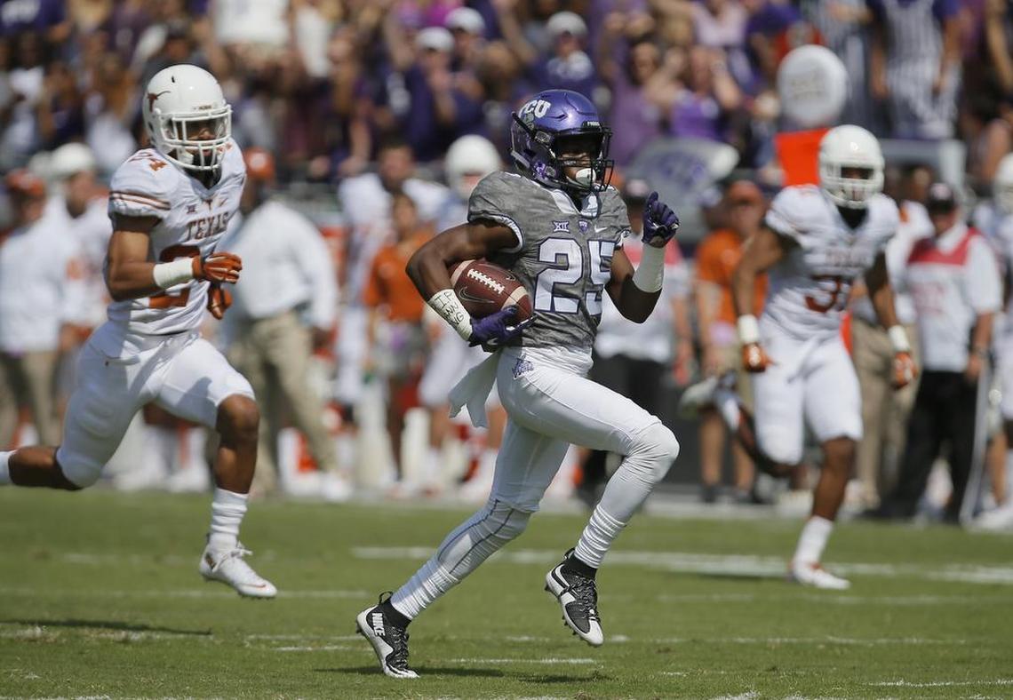TCU receiver KaVontae Turpin is on the way to scoring one of his four touchdowns in the 2015 game against Texas at Amon G. Carter Stadium.