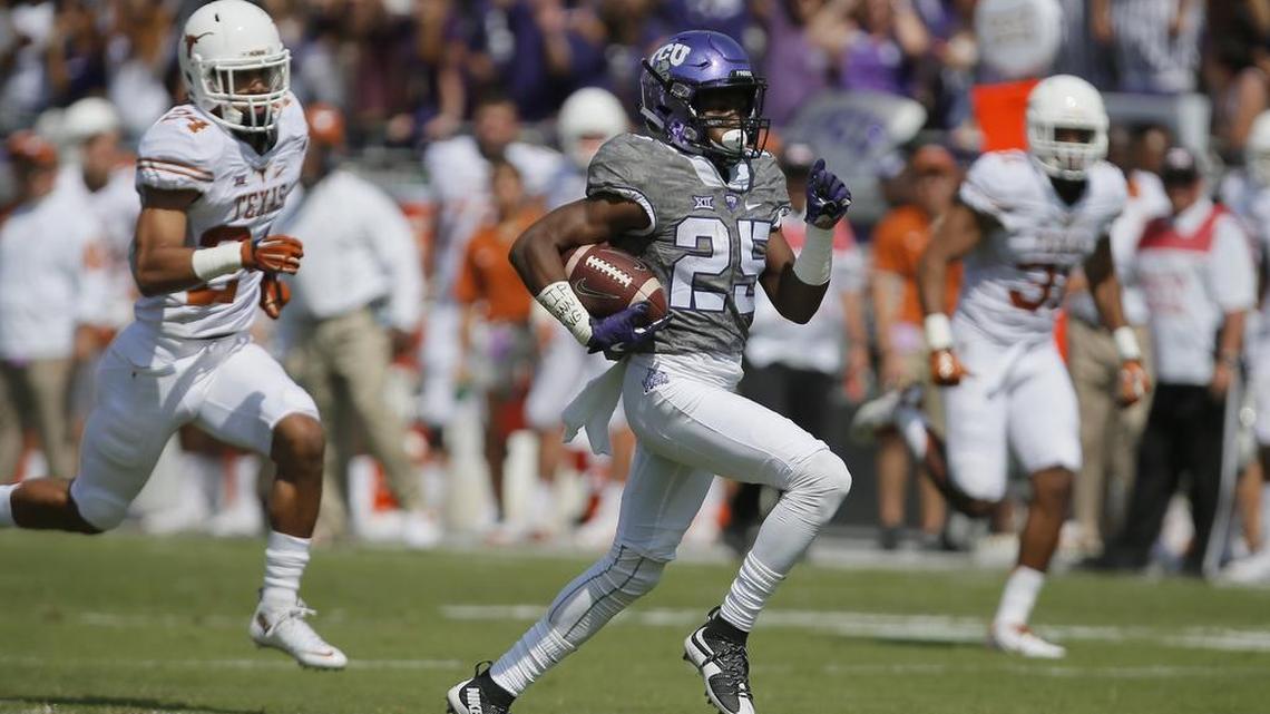 TCU receiver KaVontae Turpin is on the way to scoring one of his four touchdowns in the 2015 game against Texas at Amon G. Carter Stadium.