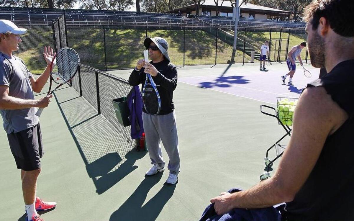 
David Roditi, center, with pro tennis player Mitchell Krueger, left, and Frogs player Facundo Lugones, right, knows how it is to be a player on the college level.


