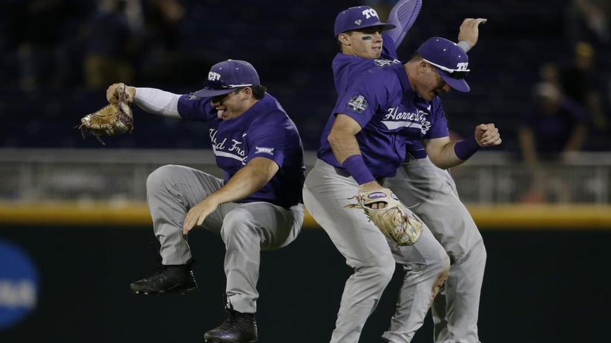 TCU outfielders celebrate following the the team's NCAA College World Series baseball game against Florida in Omaha, Neb., Friday, June 23, 2017. TCU won 9-2.