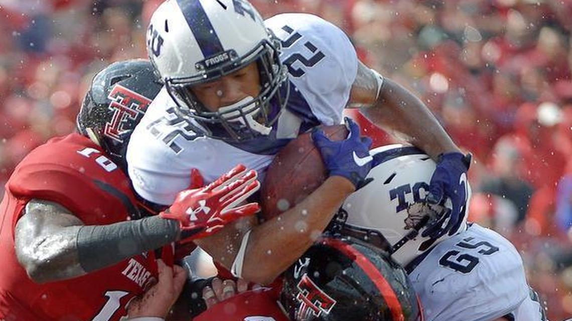 
TCU running back Aaron Green (22) scores a touchdown during the first quarter against Texas Tech at Jones AT&T Stadium in Lubbock, Texas. 
