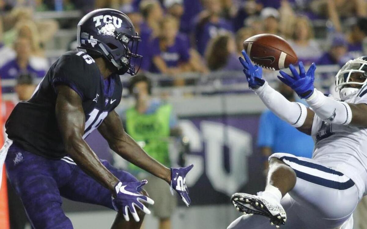 TCU receiver Jalen Reagor (left) and Jackson State defender Dario Robinson go for a pass in the end zone. The play resulted in an incompletion in the Sept. 2 game at Amon G. Carter Stadium.