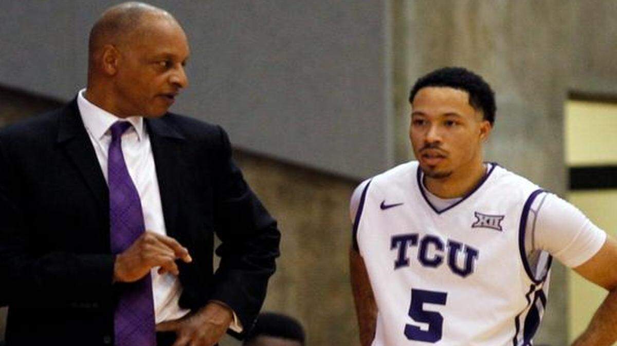 
TCU coach Trent Johnson, talking with guard Kyan Anderson, is looking for the Horned Frogs’ first conference victory after close losses to West Virginia and Kansas State.
