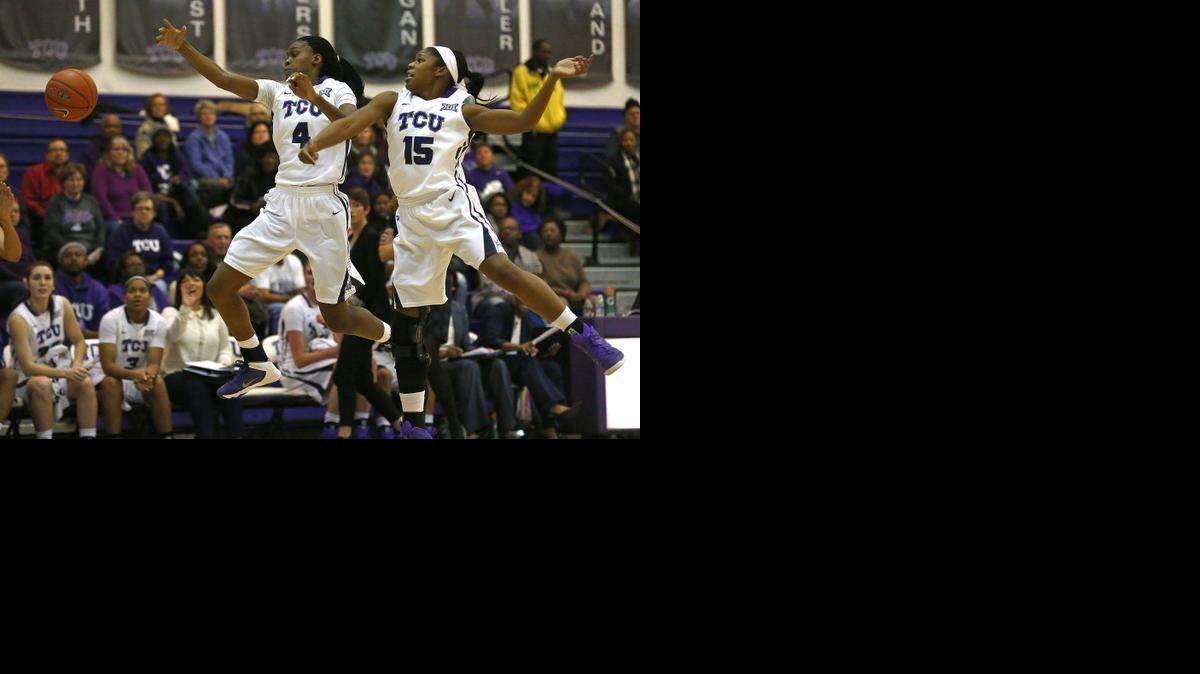 
TCU Horned Frogs Chelsea Prince (4) and Jada Butts (15) attempt a steal Jan. 7 against Iowa State. Prince leads the Big 12 with 3.25 steals per game.
