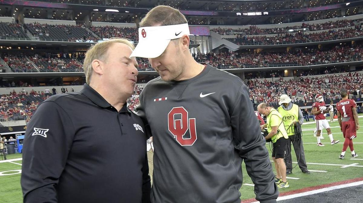 TCU head coach Gary Patterson, left, talks to Oklahoma head coach Lincoln Riley before the Big 12 Championship at AT&T Stadium on Saturday.