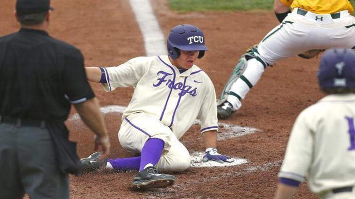 
TCU’s Connor Wanhanen slides into home plate with a first-inning run during Game 3 of a series against Baylor. The freshman from Flower Mound is fifth on the team in runs scored and first in batting average.
