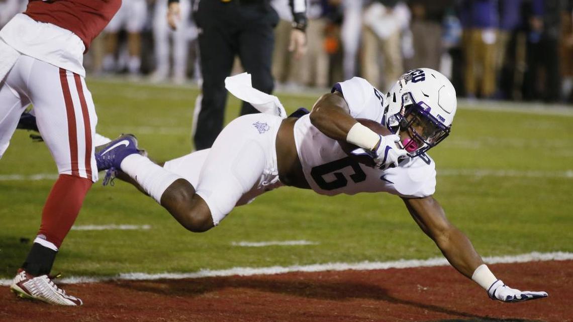 TCU running back Darius Anderson dives into the end zone on a touchdown run against Oklahoma. He leads the Horned Frogs with eight touchdown runs.