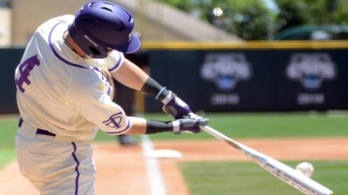 TCU second baseman Cam Warner connects with a pitch for a double in the first inning of a May 1 game against Texas Tech at Lupton Stadium.