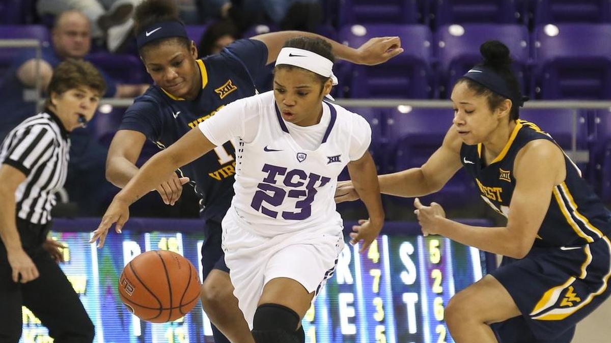 TCU guard AJ Alix was hounded by West Virginia’s Teana Muldrow, left, and Anja Martin when the teams played in Fort Worth on Dec. 29. West Virginia won in December and won Wednesday night to sweep the season series.