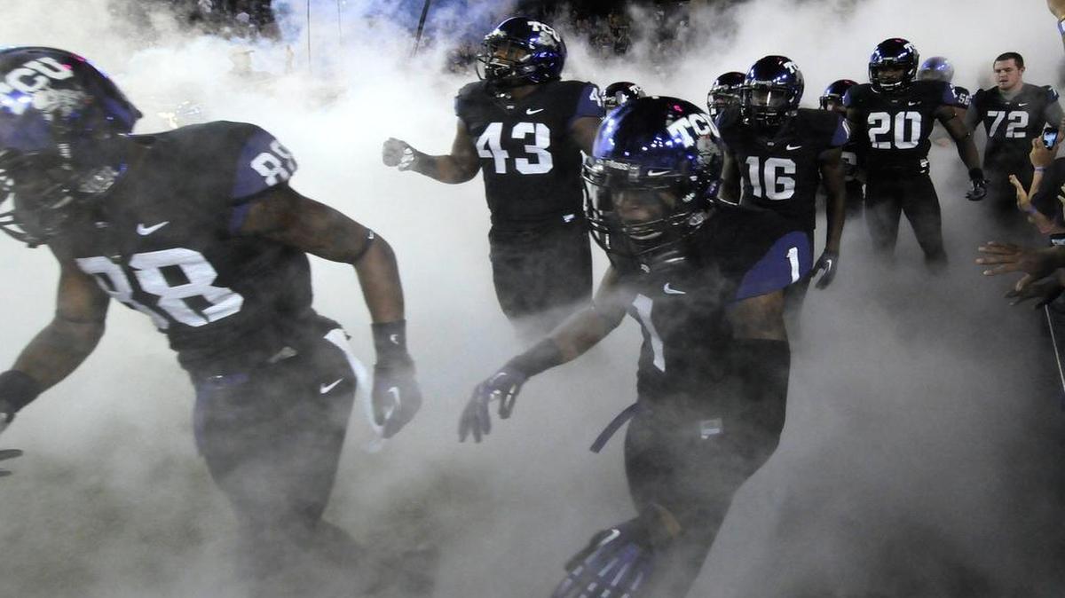 
TCU takes the field for a 2012 game against Kansas State at Amon G. Carter Stadium. The Horned Frogs won 23-10. Last year, they also defeated Kansas State in a home night game. The Big 12 released a partial schedule of kickoff times for 2015 on Monday that includes three TCU night games.
