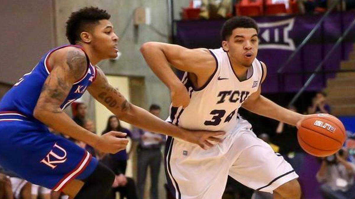 
TCU forward Kenrich Williams tries to get around Kansas guard Kelly Oubre during the first half Wednesday. Williams has been big for TCU this season but is shooting only 15 of 29 on free throws during Big 12 play.

