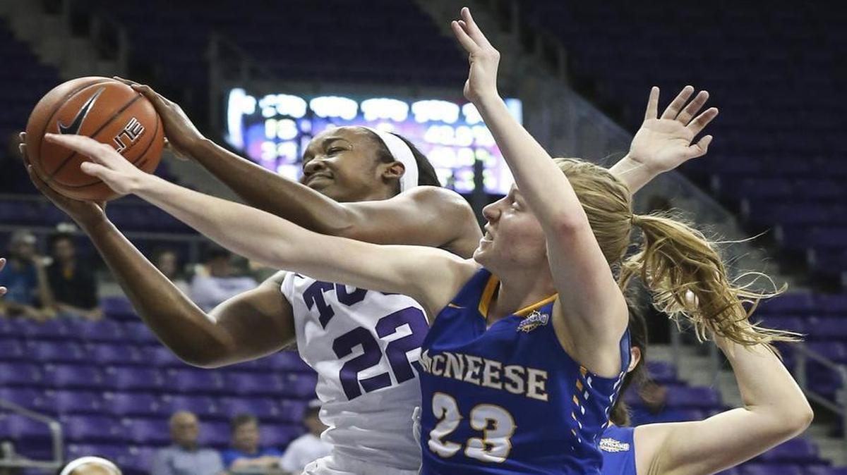 TCU center Jordan Moore, left, recorded 11 points and six rebounds to help the Horned Frogs turns back McNeese State and Amber Donnes on Sunday.