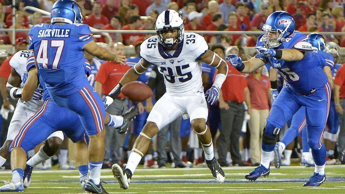 TCU linebacker Sammy Douglas goes for a block attempt on a punt by SMU’s Jamie Sackville during a Sept. 23, 2016, game at Gerald J. Ford Stadium in Dallas.