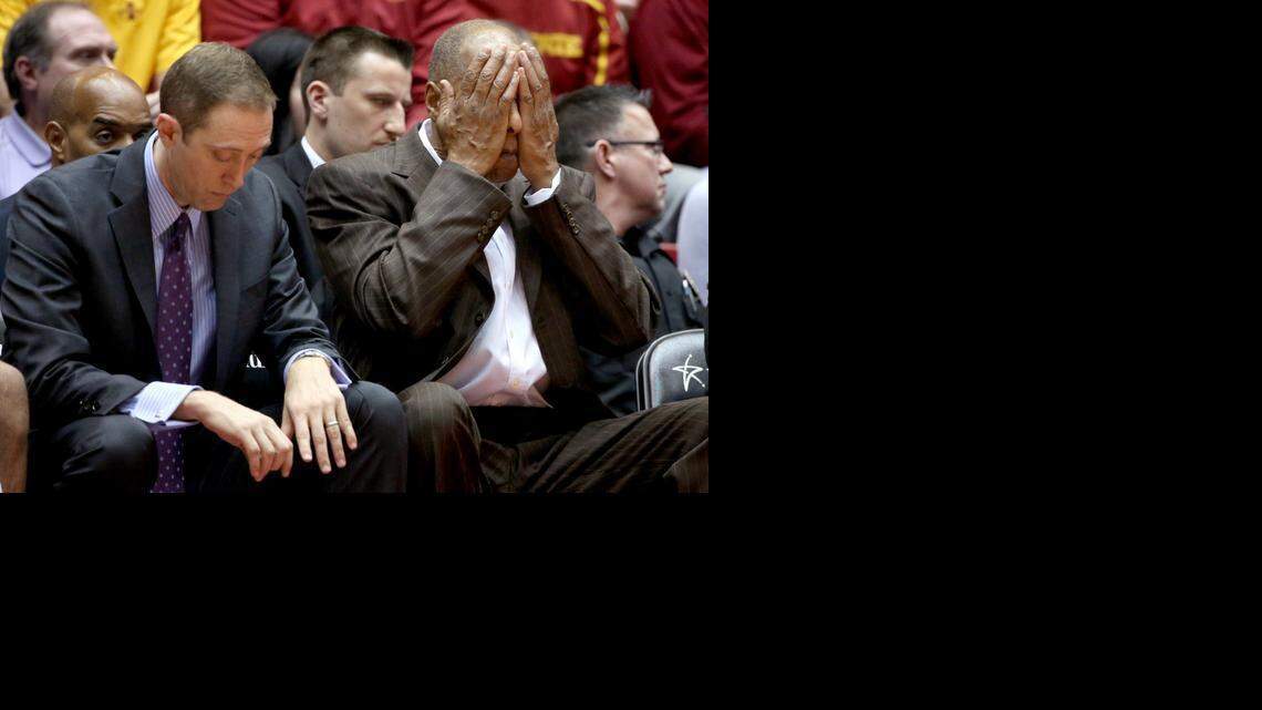 
TCU assistant coach Chris Tifft, left, and  head coach Trent Johnson react after a turnover by their team during the second half against Iowa State on Saturday.
