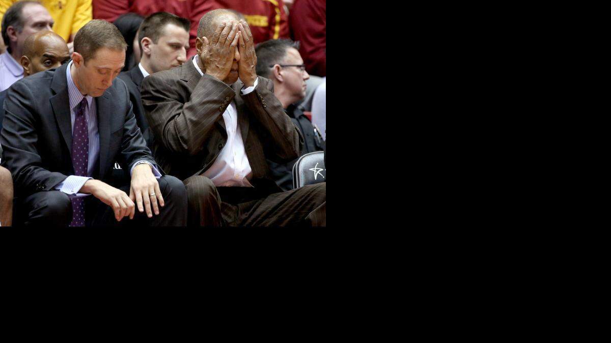 
TCU assistant coach Chris Tifft, left, and  head coach Trent Johnson react after a turnover by their team during the second half against Iowa State on Saturday.
