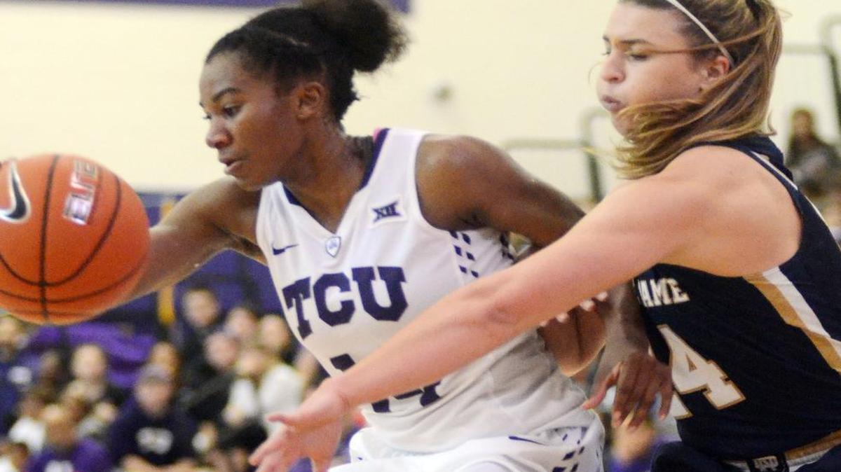 TCU’s Zahna Medley, left, tries to drive towards the basket as Notre Dame’s Hannah Huffman attempts to steal the ball in the fourth period Saturday. at the University Recreation Center in Fort Worth, Texas. Notre Dame went on to win 88-72.