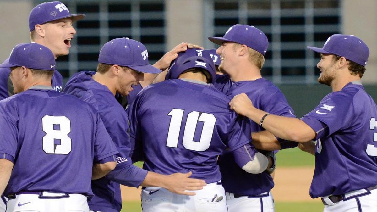 Dane Steinhagen is congratulated after his bases-loaded walk brought in the game-winning run.