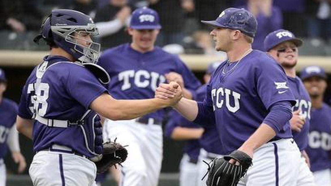 
TCU closer Riley Ferrell, right, is congratulated by catcher Alex Young after the Frogs beat Baylor 3-2 on Saturday at Lupton Stadium.

