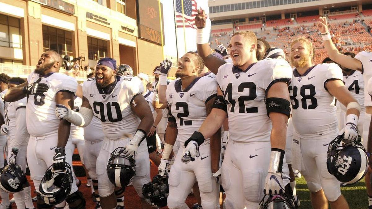 TCU players celebrate a win over Oklahoma State at Boone Pickens Stadium in Stillwater, Okla., on Sept. 23.