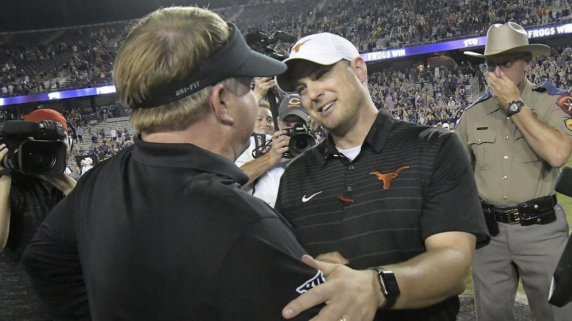 TCU head coach Gary Patterson, left, and Texas head coach Tom Herman shake hands after the Horned Frogs’ 24-7 win on Nov. 4.