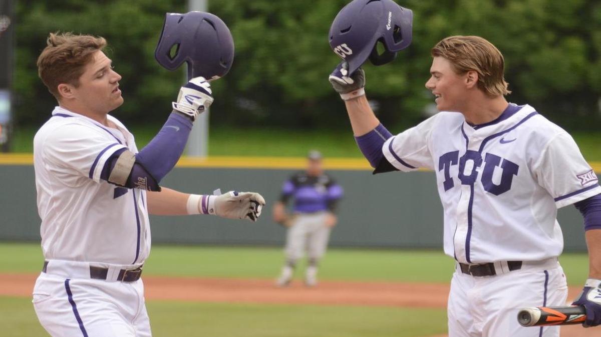 
TCU senior Derek Odell knocks helmets with Connor Wanhanen to celebrate a solo home run in the first inning Tuesday night against Abilene Christian. It was the second home run of the year for the senior third baseman.
