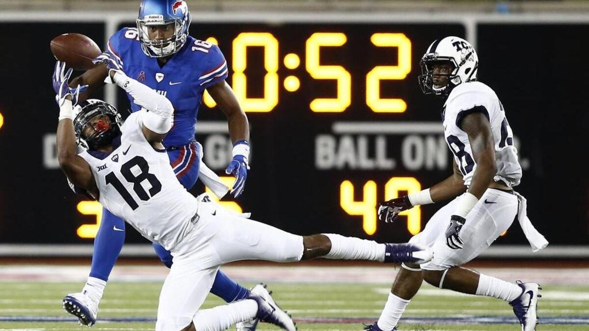 TCU safety Nick Orr breaks up a pass intended for SMU receiver Courtland Sutton during second-half action in a Sept. 23 game at Gerald J. Ford Field in Dallas. Orr had his first interception of the season in the game.