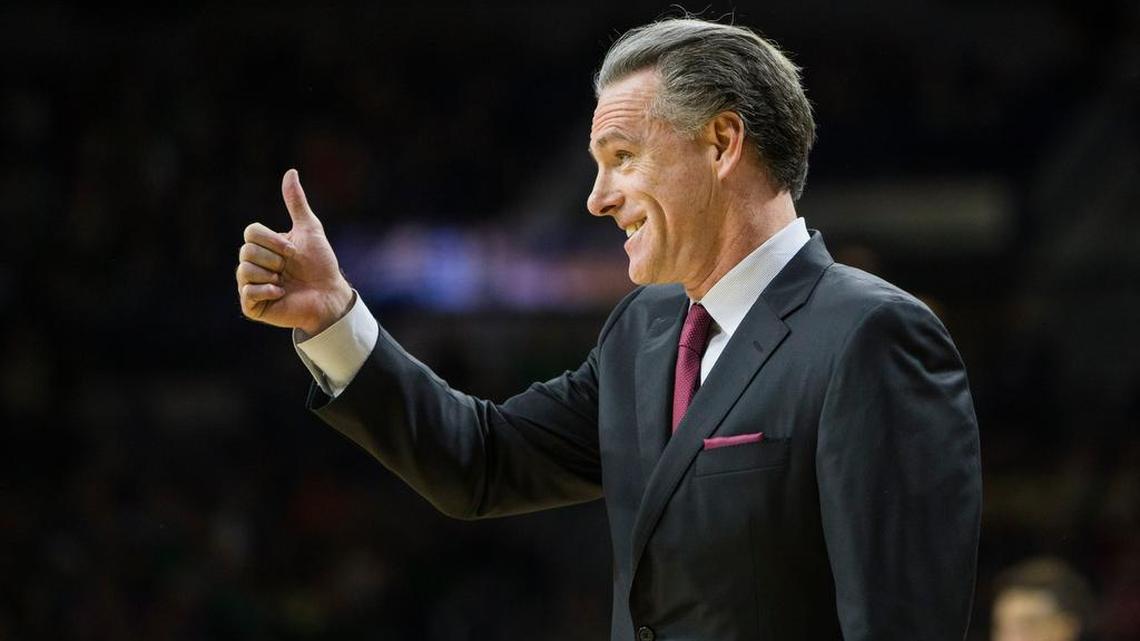 Jamie Dixon signals to his players during Pitt’s game against Notre Dame on Jan. 9 at South Bend, Ind.