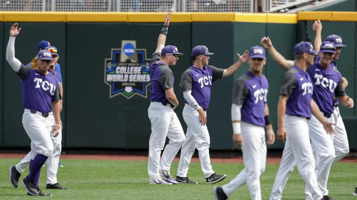 TCU players warm up on the field at TD Ameritrade Park prior to batting practice Friday. The Horned Frogs are in the College World Series for the fifth time in eight seasons.