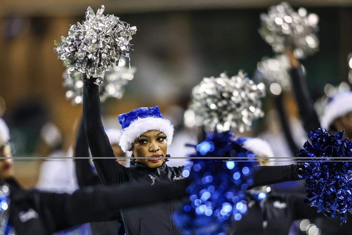The North Crowley dance team performs before the Class 6A Division I regional final against Allen on Friday, Dec. 5, 2025, at DATCU Stadium in Denton.