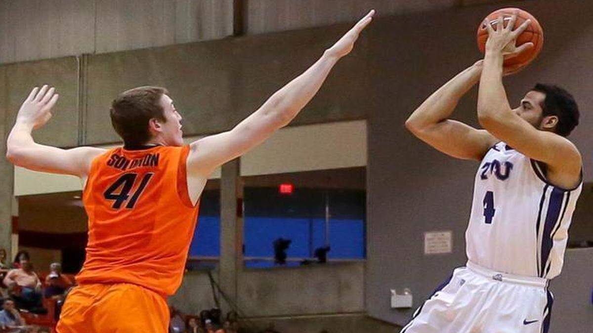 
TCU forward Amric Fields loads up a shot against Oklahoma State. The Horned Frogs shot 52 percent, their best in conference this year.
