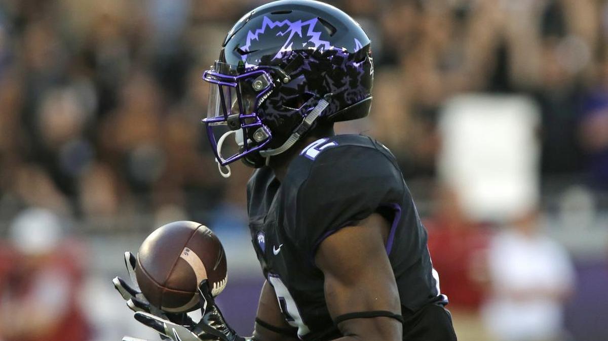 TCU receiver Taj Williams (2) returned to Saturday’s game against No. 12 West Virginia after being shaken up in the first quarter. The Horned Frogs trail, 21-10, at the half.