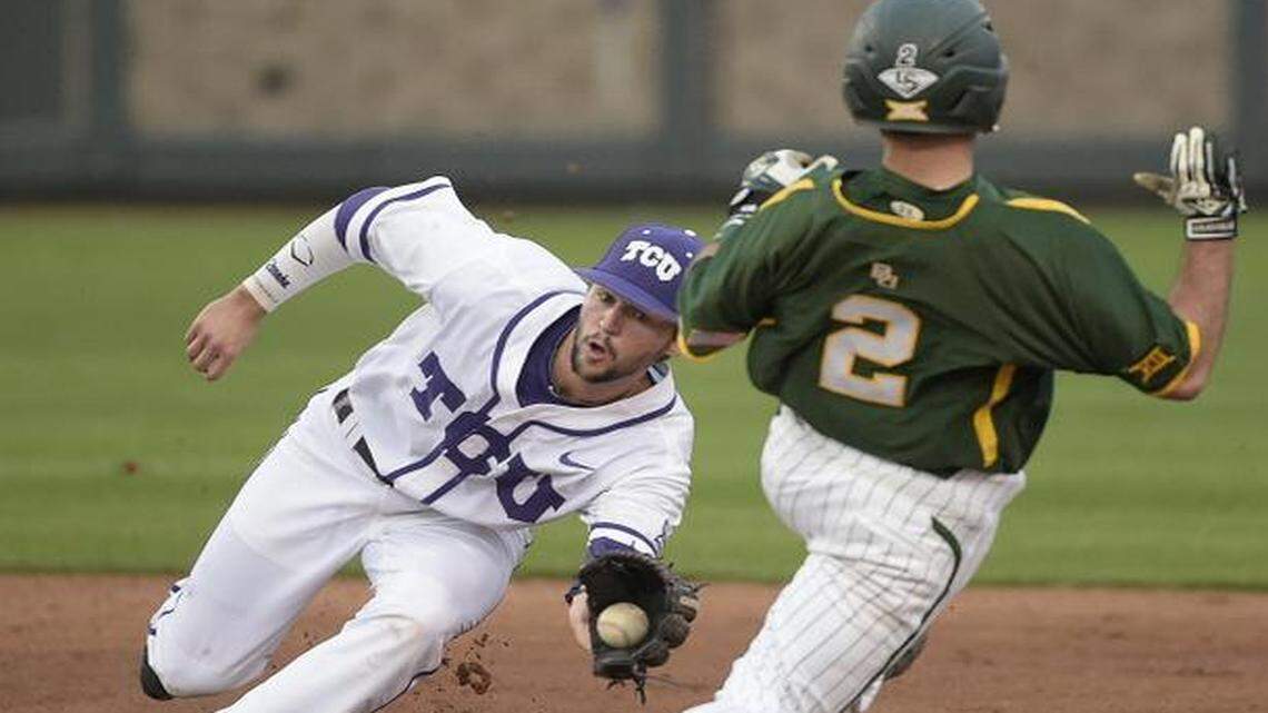 
Baylor infielder Steven McLean (2) is caught stealing by TCU infielder Garrett Crain (34) as TCU beats Baylor 3-1 at Lupton Stadium  on Friday. 
