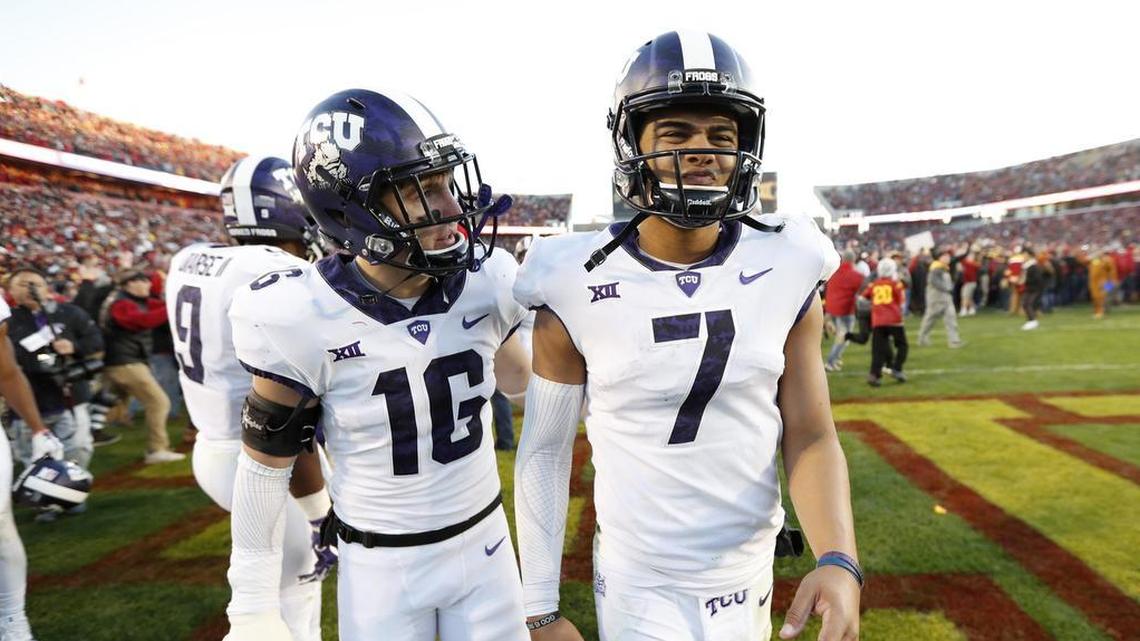 TCU quarterback Kenny Hill, right, and safety Michael Downing Jr. console each other after Saturday’s 14-7 loss at Iowa State. Hill had his worst outing of the season, throwing two interceptions and losing a fumble.