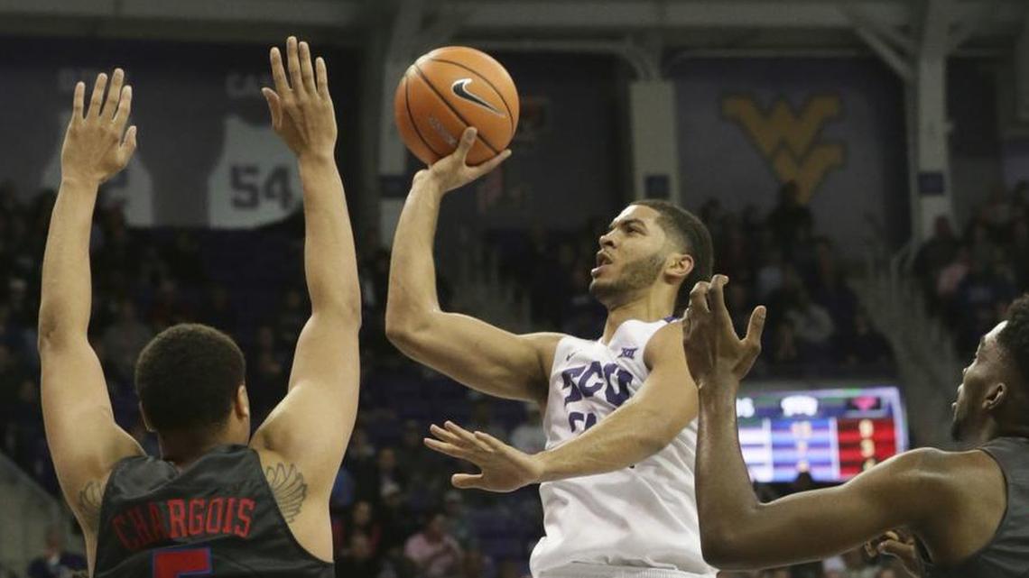 TCU guard Kenrich Williams drives for a floater in first-half action against SMU in a Dec. 5 game at Schollmaier Arena. He scored a career-high 27 points in TCU’s 94-83 victory.