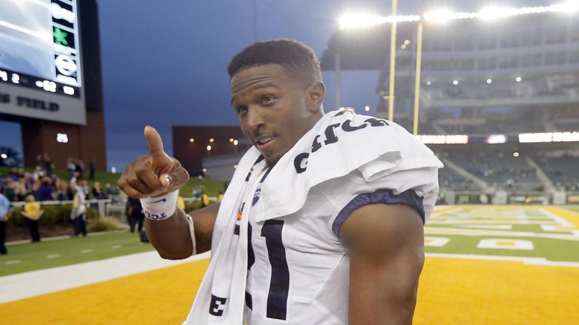 TCU running back Kyle Hicks acknowledges fans as he walks off the field following the Horned Frogs’ 62-22 victory at Baylor on Nov. 5. Hicks scored a career-high five touchdowns and ran for a career-high 195 yards.