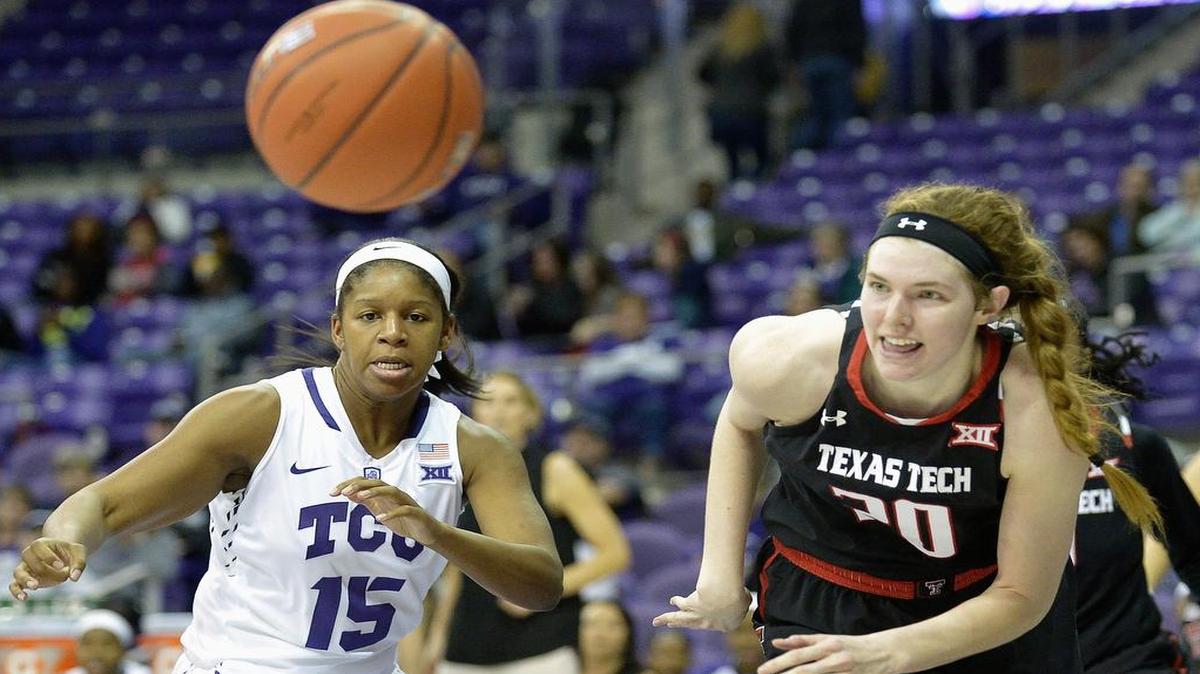 TCU’s Jada Butts (15) and Texas Tech’s Brittany Brewer (20) chase a loose ball in fourth-quarter action Wednesday.