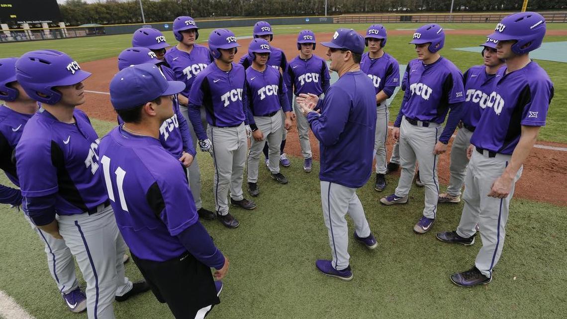 TCU Associate Head Coach Bill Mosiello (c) talks to players as the TCU Horned Frogs held their first baseball practice of the season in Fort Worth, Friday, January 26, 2018.