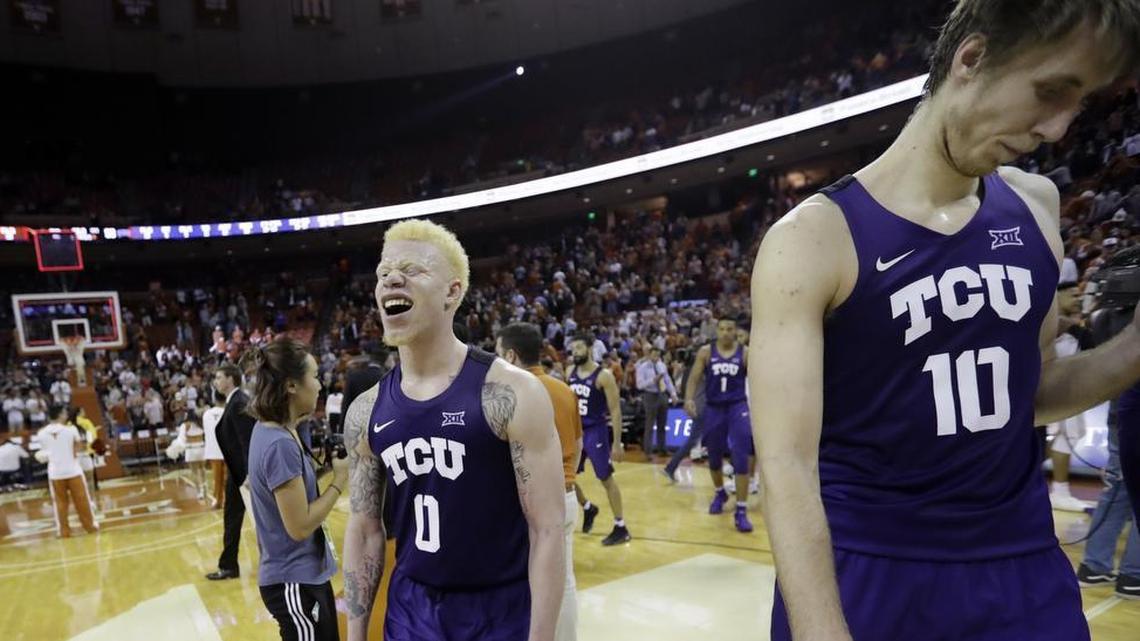 TCU guard Jaylen Fisher (0) and forward Vladimir Brodziansky (10) walk off the court after the team's 99-98 loss to Texas in double overtime in an NCAA college basketball game Wednesday, Jan. 10, 2018, in Austin.