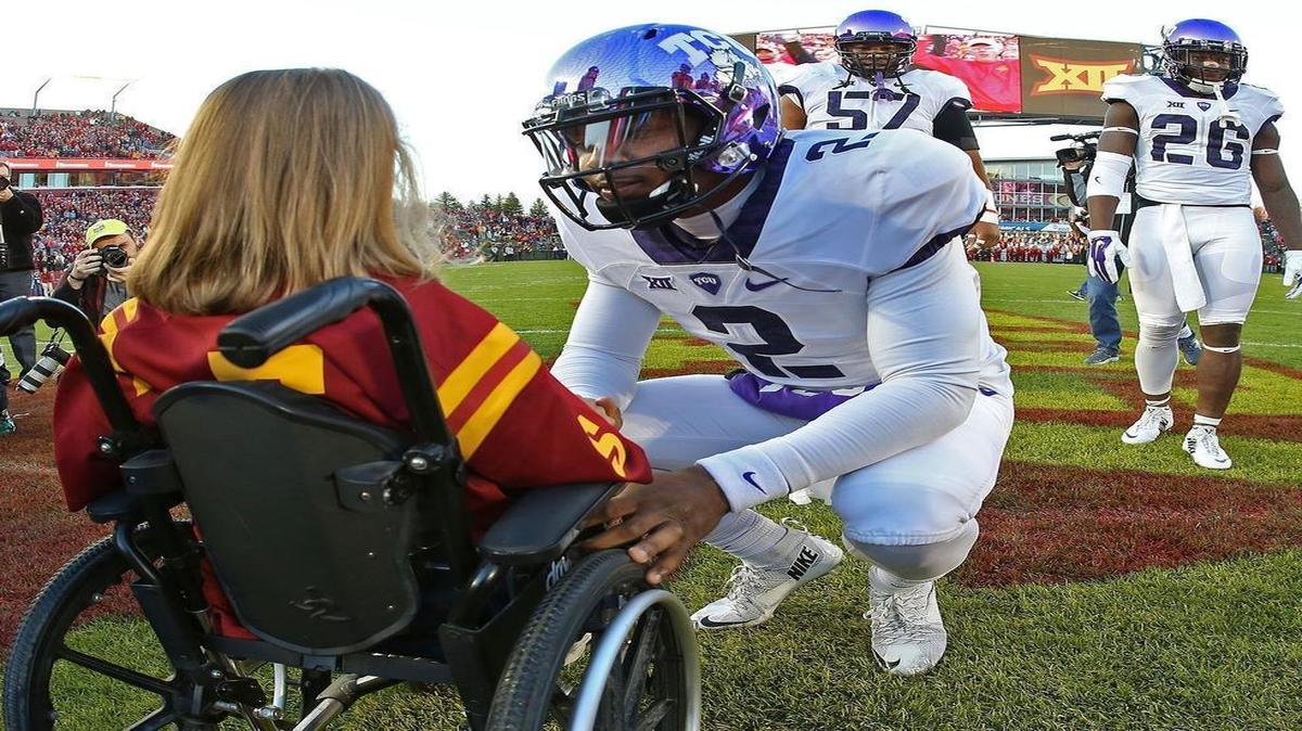 Abby Faber, photographed with TCU quarterback Trevone Boykin during the pre-game coin toss at an Iowa State two weeks ago, might be attending Thursday’s game against West Virginia.
