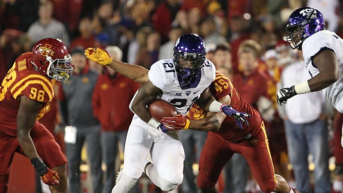 TCU running back Kyle Hicks runs against Iowa State in a game at Jack Trice Stadium in Ames, Iowa, in October 2015. Snow and temperatures in the 20s are expected for Saturday when the Horned Frogs play the Cyclones in Ames.