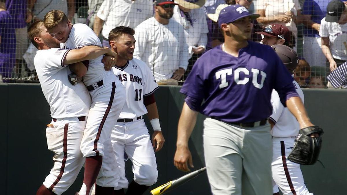 
Texas A&M celebrates their 2-1 win as TCU relief pitcher Riley Ferrell (12) walks away after game 2 of the NCAA Super Regional at Lupton Stadium on Sunday.
