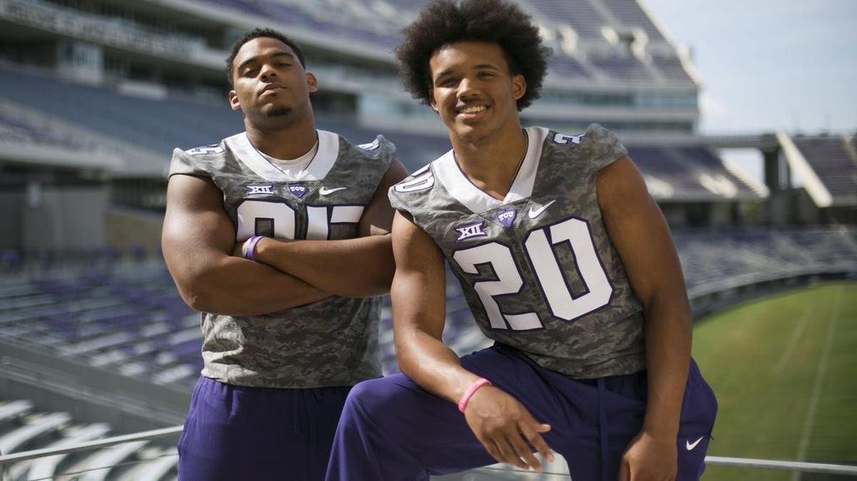 
Defensive tackle Aaron Curry (left) and linebacker Montrel Wilson have more than Keller Fossil Ridge in common. They’re unexpected starters at TCU and rank third and fourth on the team in tackles.
