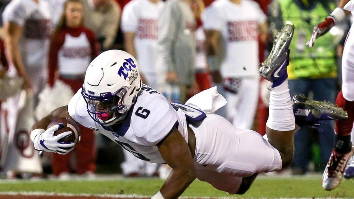 TCU running back Darius Anderson dives into the end zone for a touchdown in the first quarter of a Nov. 11 game at Oklahoma. The sophomore from Rosenberg led the Frogs in rushing yards and rushing touchdowns in the regular season.