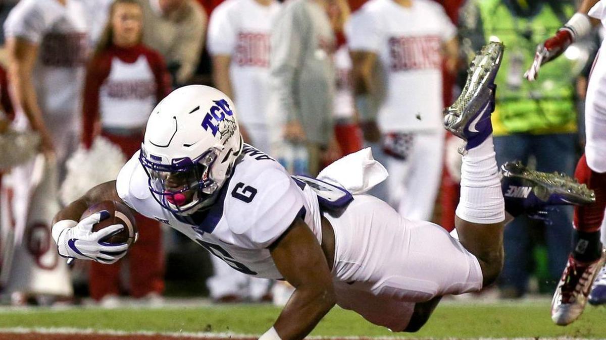 TCU running back Darius Anderson dives into the end zone for a touchdown in the first quarter of a Nov. 11 game at Oklahoma. The sophomore from Rosenberg led the Frogs in rushing yards and rushing touchdowns in the regular season.