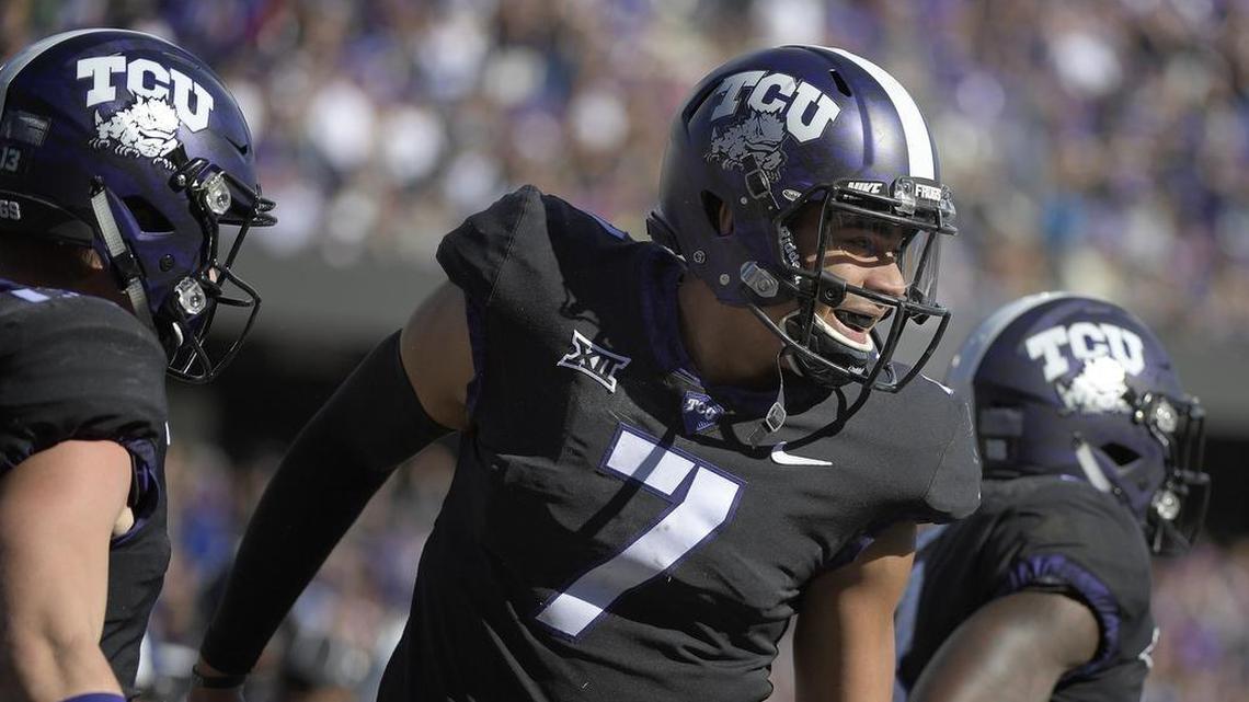 TCU quarterback Kenny Hill reacts after scoring on a touchdown run in the fourth quarter Friday against Baylor at Amon G. Carter Stadium, helping the Horned Frogs lock up a spot in the Big 12 championship game.