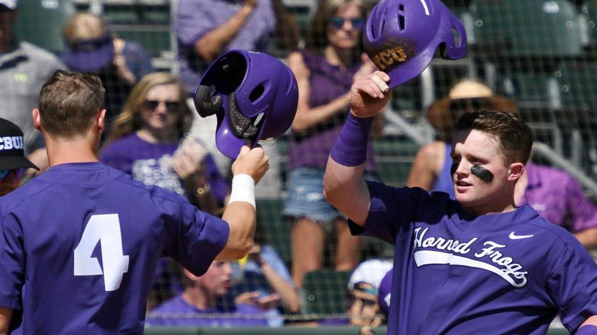 TCU’s Cam Warner, left, celebrates as Evan Skoug crosses home plate after hitting a grand slam home run as part of a six-run third inning to take a 13-1 lead over Murray State during Saturday’s April 8, 2017 baseball game at Lupton Stadium, in Fort Worth, Texas. TCU went on to win 15-6.