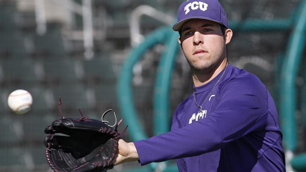TCU pitcher Mitchell Traver, pictured playing catch before a January practice, made his season debut Sunday at Penn State with two shutout innings.
