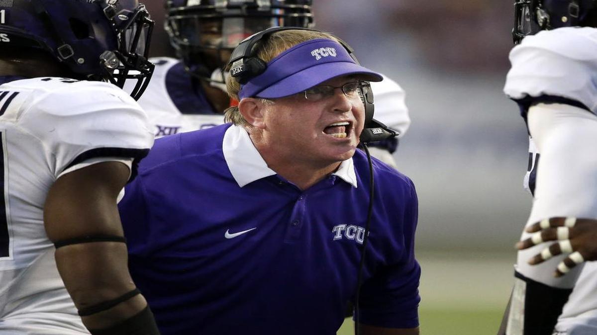 
TCU coach Gary Patterson gives instructions to the defense during the first half of Saturday night’s game against Kansas State. The Horned Frogs gave up 266 yards and five touchdowns before halftime.
