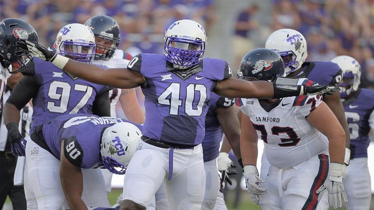 TCU defensive end James McFarland (40) celebrates after making a stop against Samford in 2014. McFarland missed last season with a broken toe.